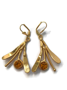 Boucles d'oreilles en laiton doré, composées de petites feuilles, avec strass ambre au centre
